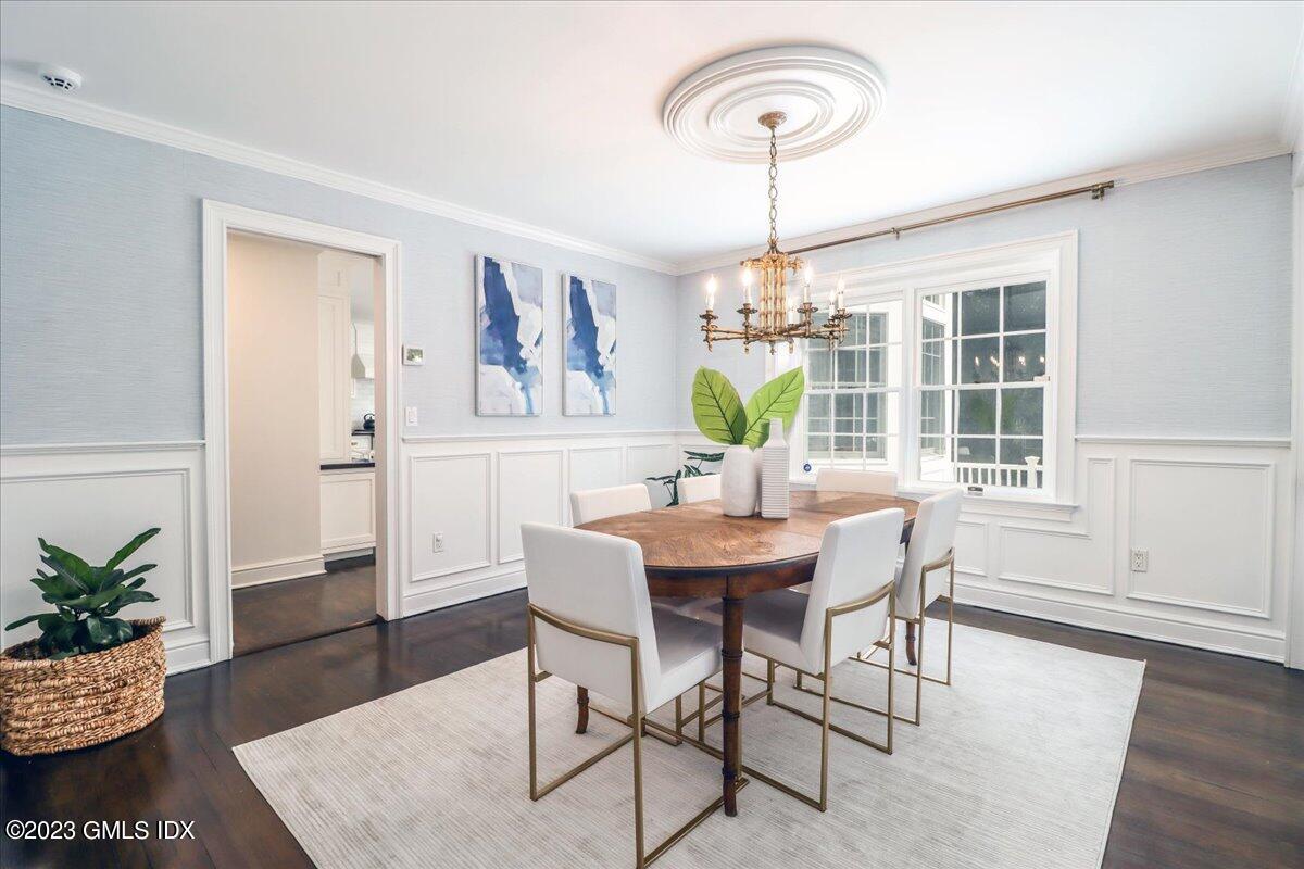 62 North Old Stone Bridge Road Cos Cob, CT 06807 - Photo 15 of 32 a view of a dining room with furniture window and wooden floor