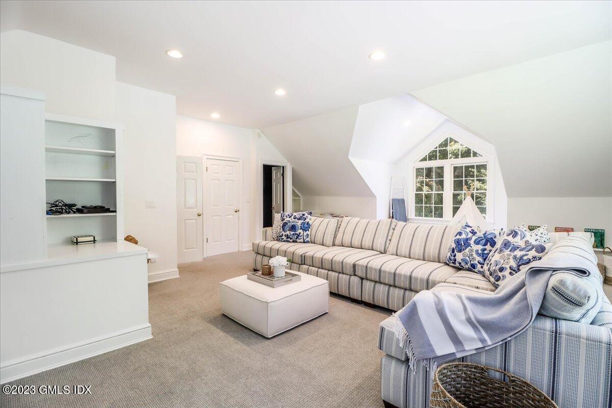 62 North Old Stone Bridge Road Cos Cob, CT 06807 - Photo 16 of 32 a living room with furniture and a large window