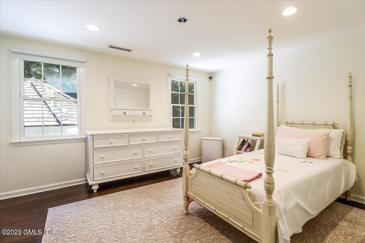 62 North Old Stone Bridge Road Cos Cob, CT 06807 - Photo 23 of 32 a bedroom with a bed and a window