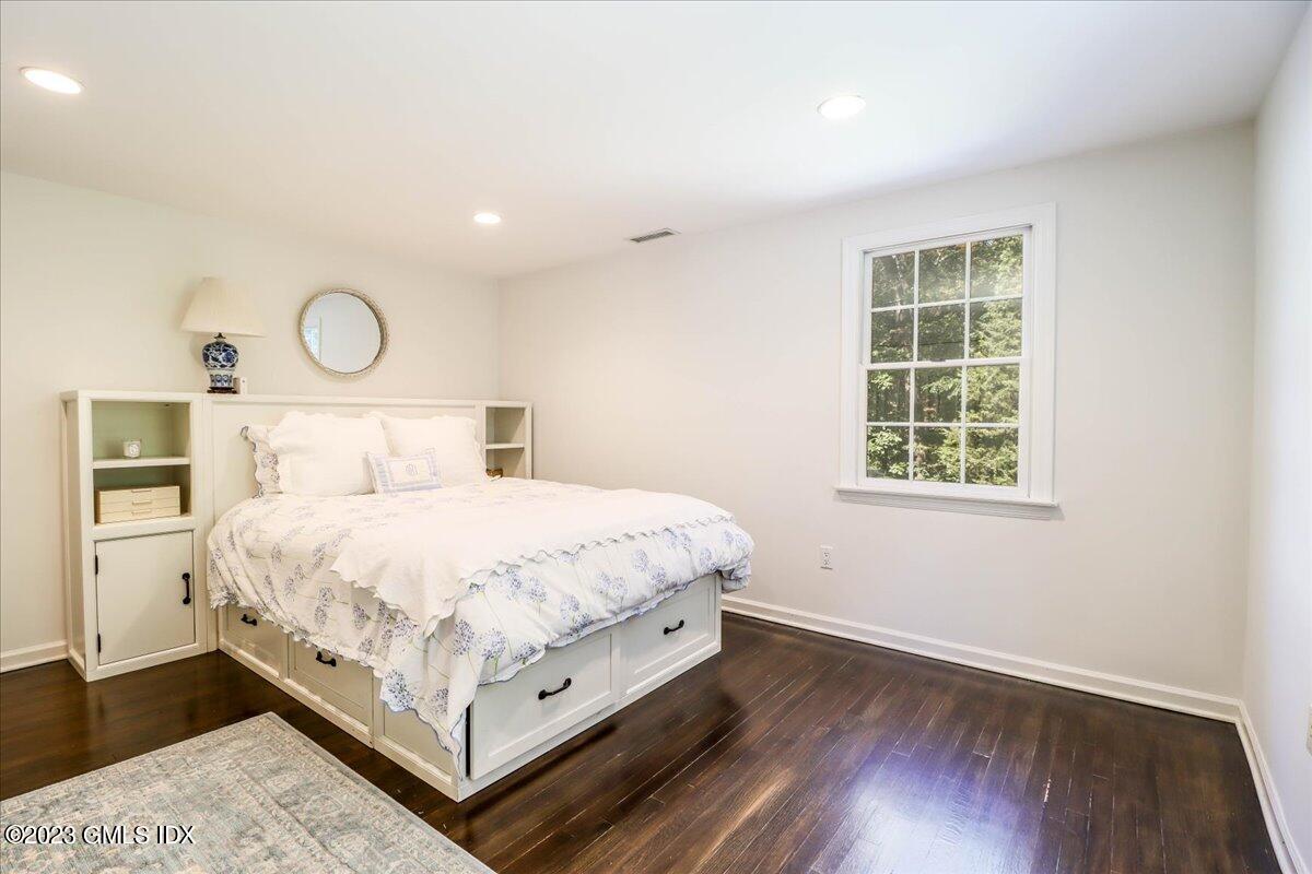 62 North Old Stone Bridge Road Cos Cob, CT 06807 - Photo 24 of 32 a bedroom with a bed and window