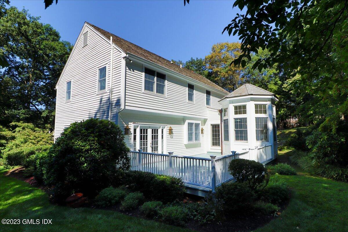 62 North Old Stone Bridge Road Cos Cob, CT 06807 - Photo 28 of 32 a house view with a garden space
