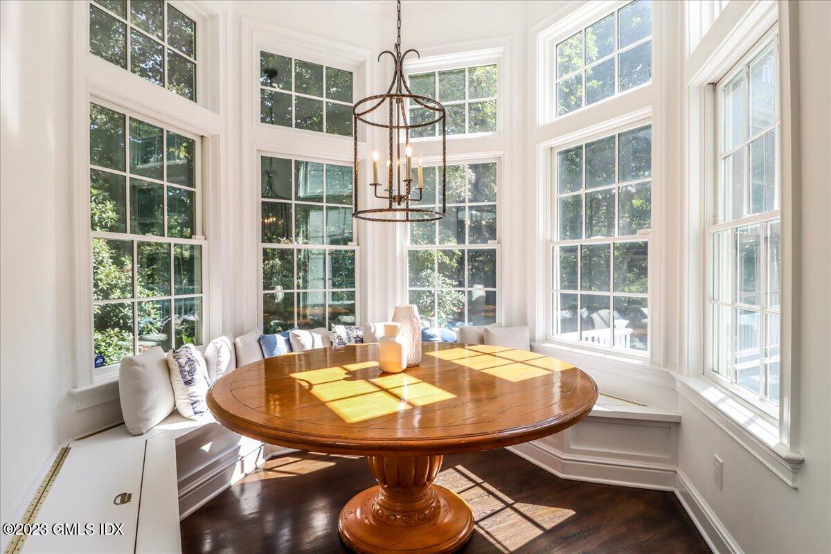62 North Old Stone Bridge Road Cos Cob, CT 06807 - Photo 8 of 32 a view of a dining room with furniture window and outside view