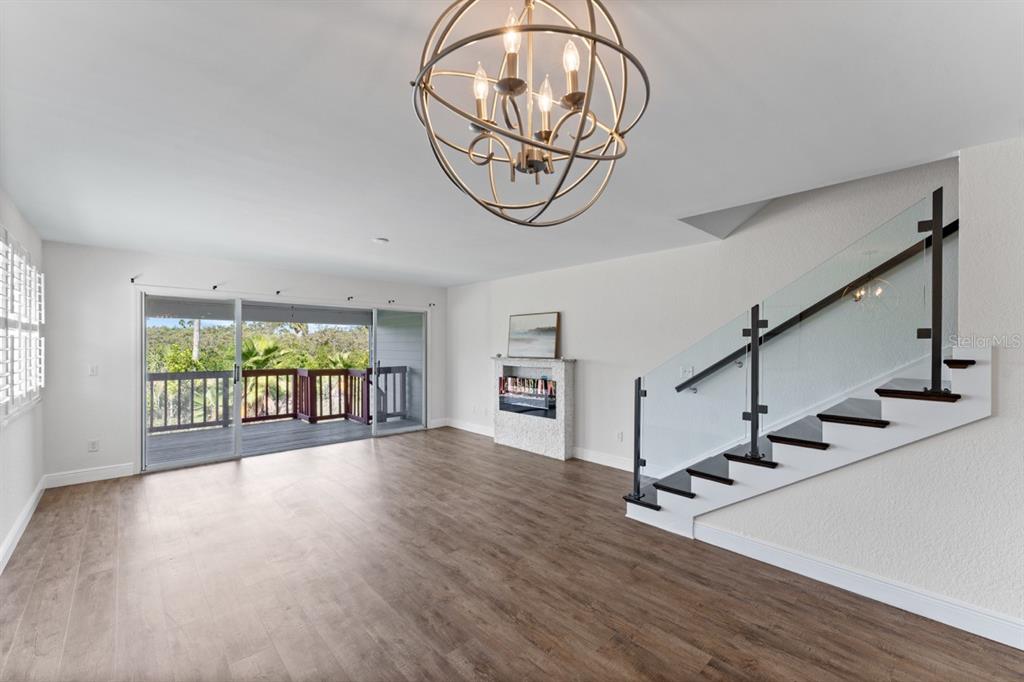 802 Hidden Harbour Drive Indian Rocks Beach, FL 33785 - Photo 5 of 31 a view of an entryway with wooden floor