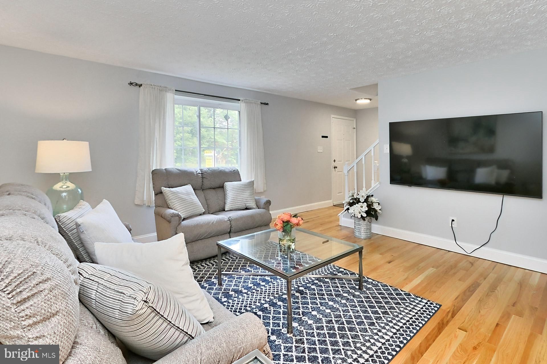 Living room has large picture window