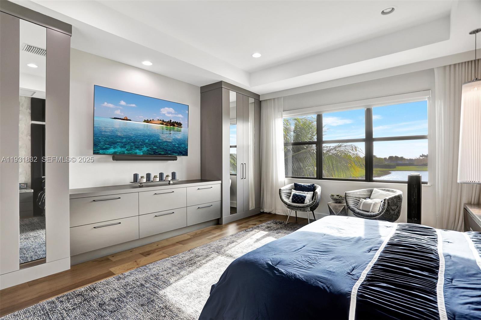 17113 Aquavera Way Boca Raton, FL 33496 - Photo 42 of 84 a bedroom with a bed and large window