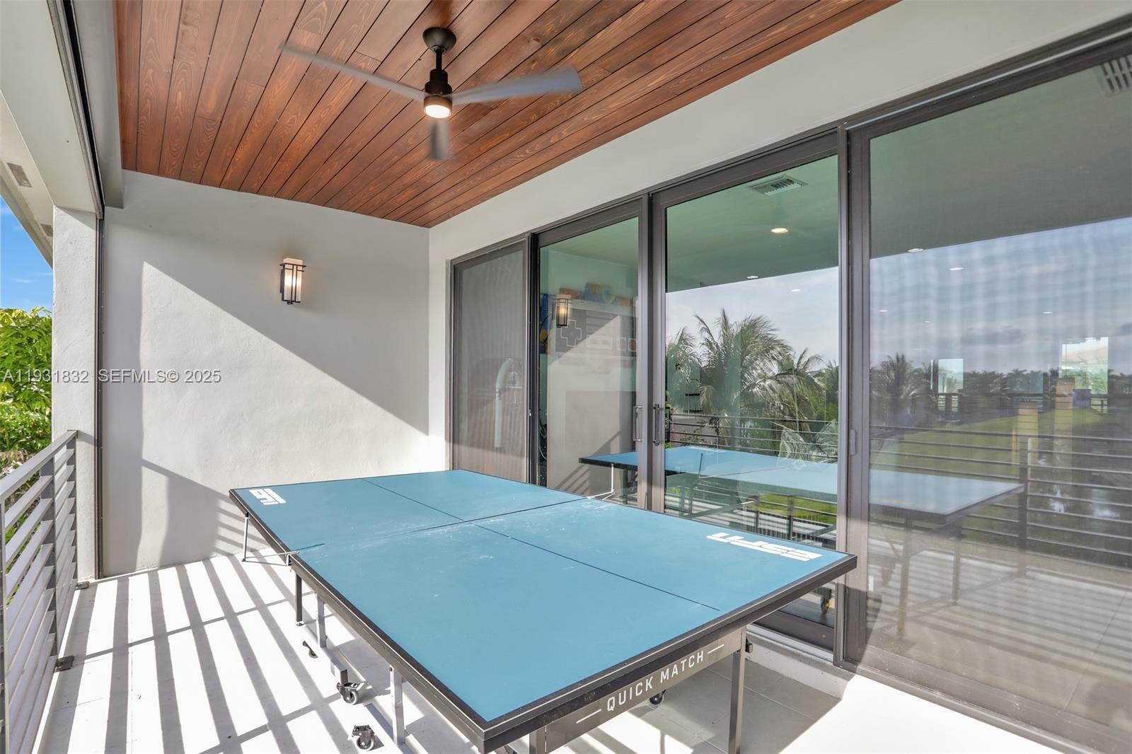 17113 Aquavera Way Boca Raton, FL 33496 - Photo 55 of 84 a room with pool table and windows