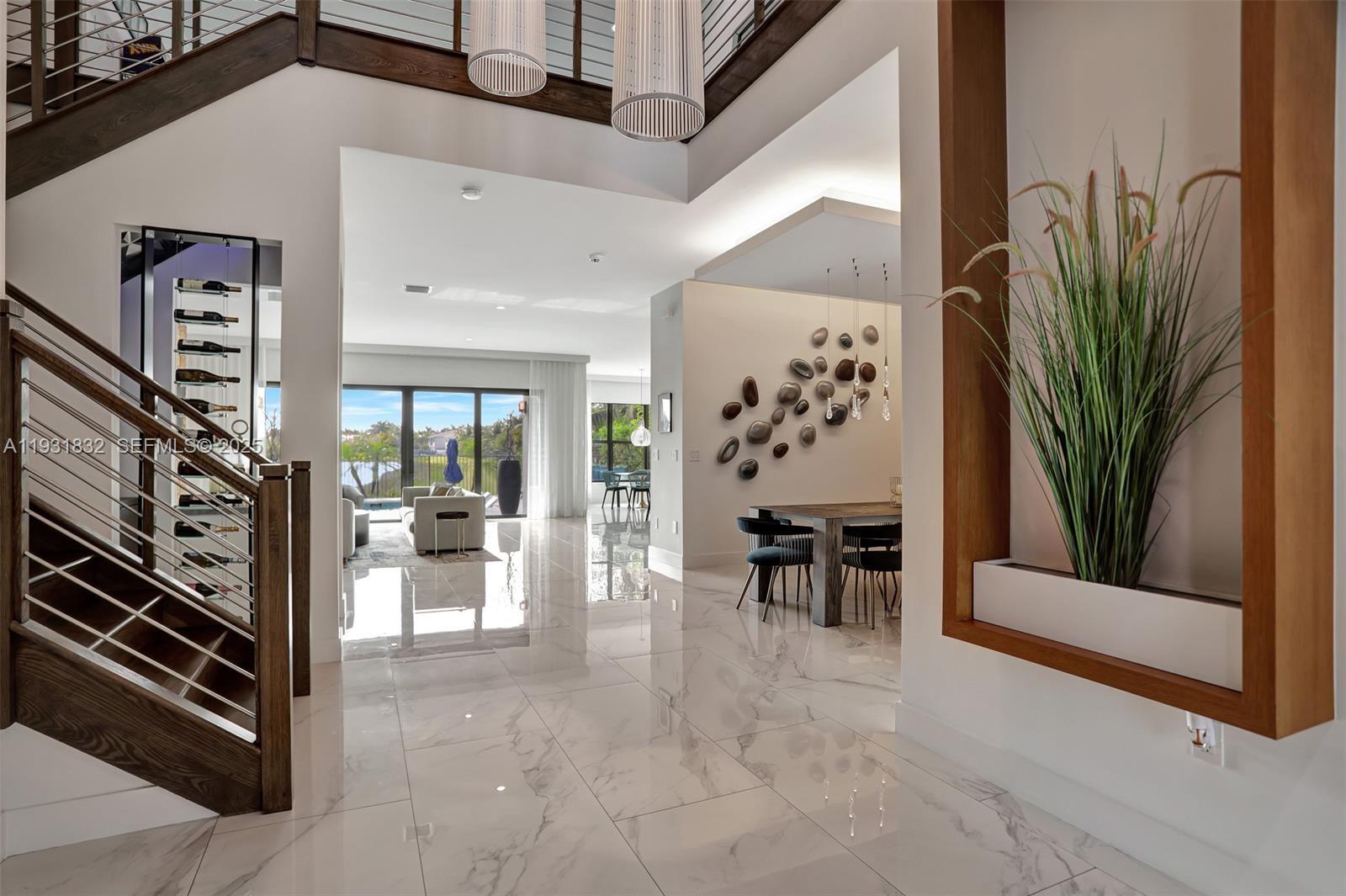 17113 Aquavera Way Boca Raton, FL 33496 - Photo 6 of 84 a view of livingroom with furniture and floor to ceiling window