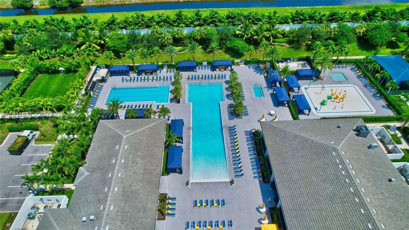 17113 Aquavera Way Boca Raton, FL 33496 - Photo 79 of 84 an aerial view of a house with a yard basket ball court and outdoor seating