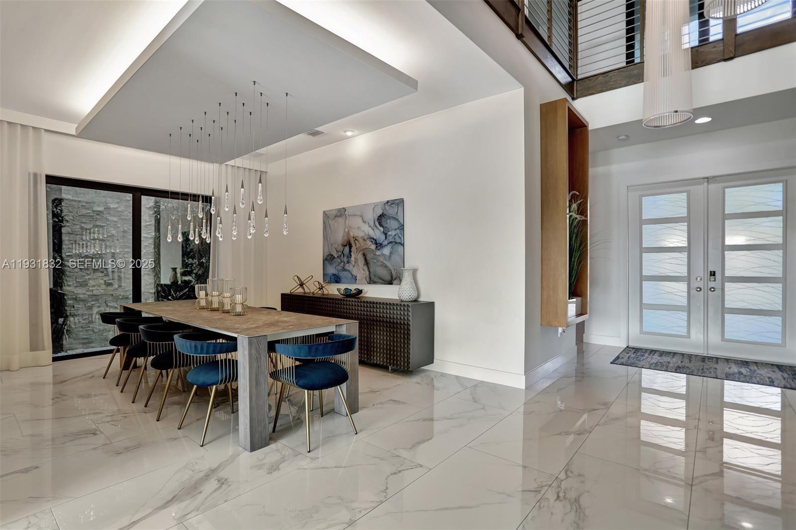 17113 Aquavera Way Boca Raton, FL 33496 - Photo 8 of 84 a view of a dining room with furniture