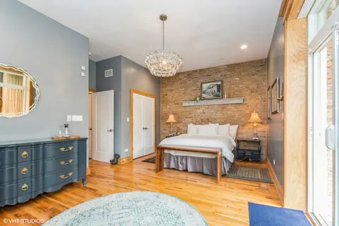 a living room with a bed and furniture