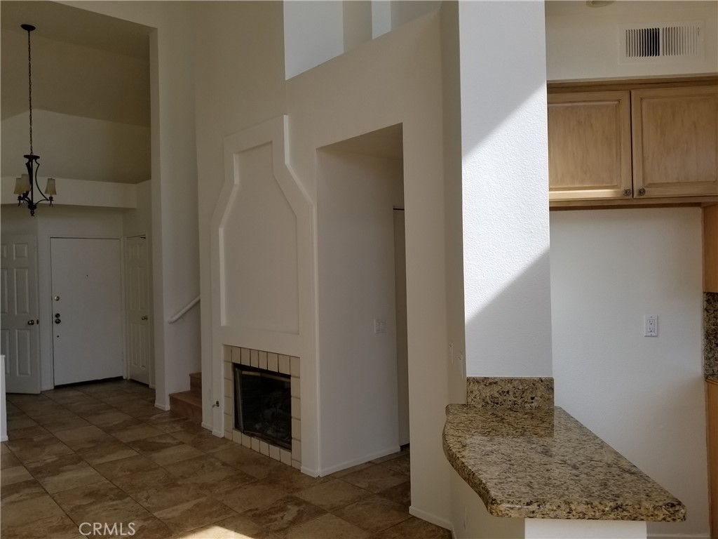 28225 Via Fierro Laguna Niguel, CA 92677 - Photo 18 of 70 a living room with furniture and a fireplace