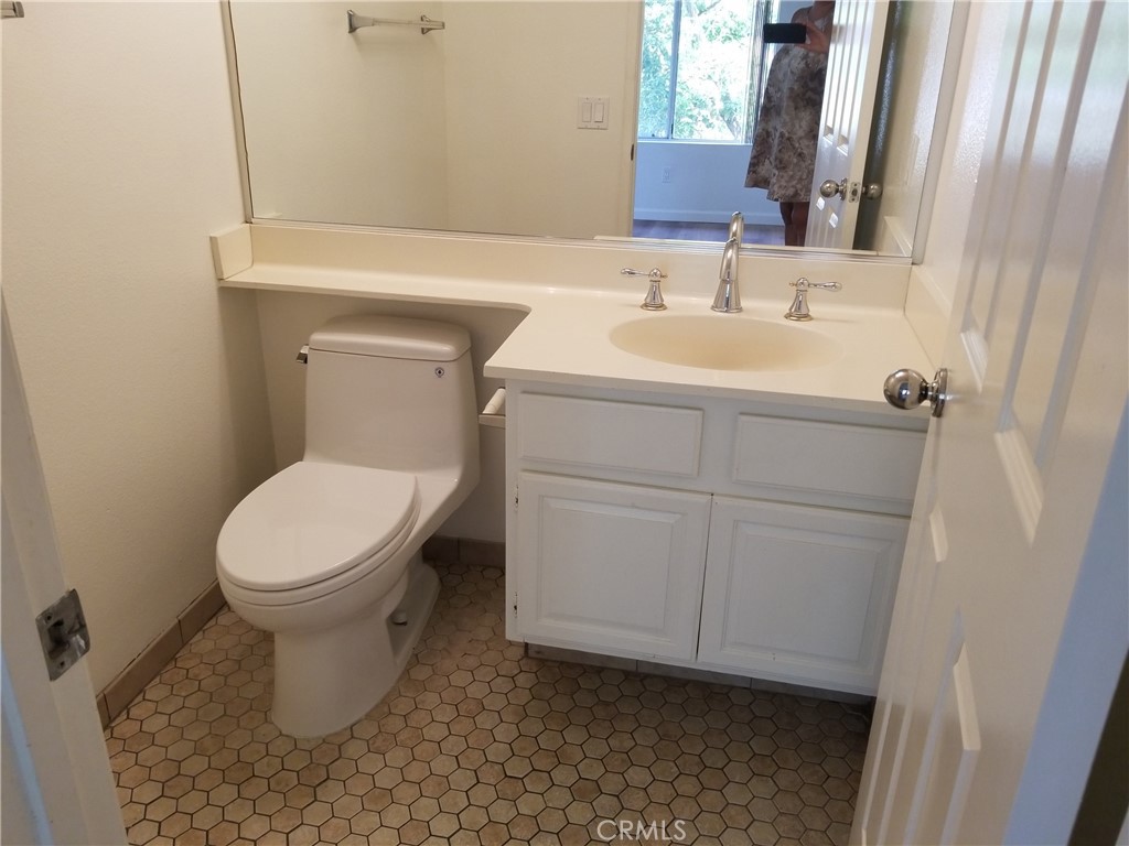 28225 Via Fierro Laguna Niguel, CA 92677 - Photo 19 of 70 a bathroom with a sink and a toilet