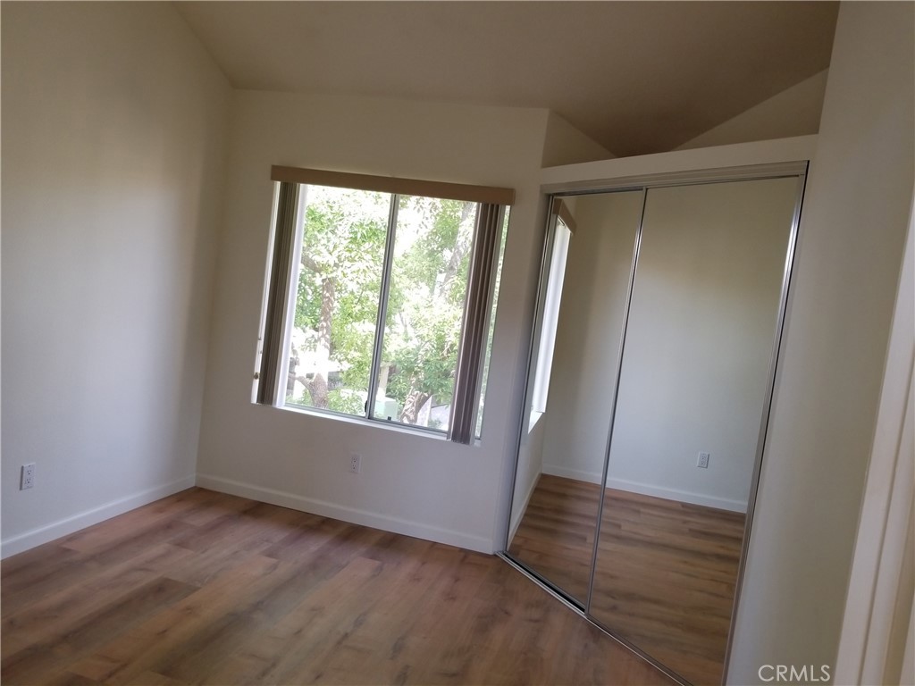 28225 Via Fierro Laguna Niguel, CA 92677 - Photo 20 of 70 an empty room with wooden floor and windows