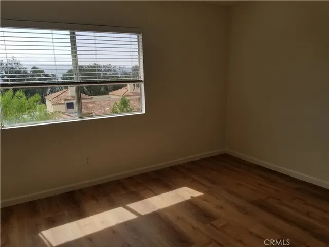 a view of hallway with livingroom
