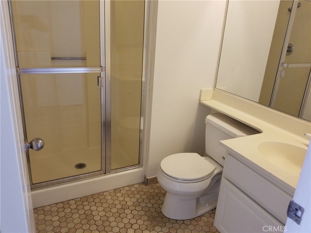 28225 Via Fierro Laguna Niguel, CA 92677 - Photo 31 of 70 a bathroom with a sink and a toilet