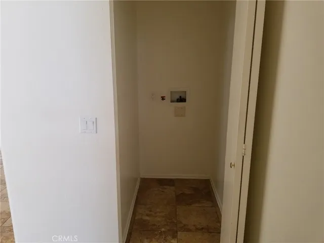 a view of balcony with furniture