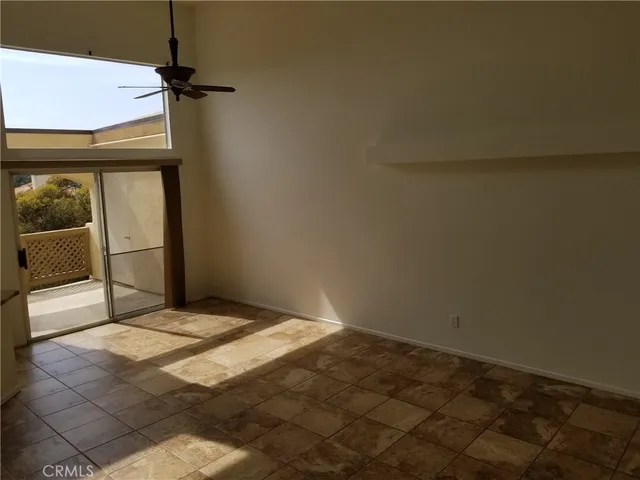 a aerial view of a house with a yard