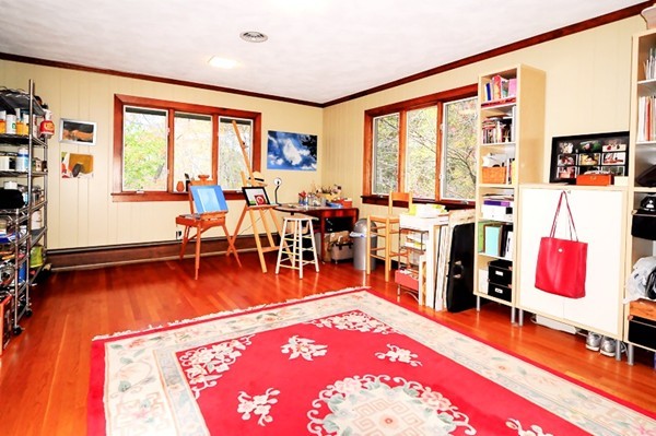 3 Bridge Street Dover, MA 02030 - Photo 11 of 15 a living room with furniture a rug and a floor to ceiling window