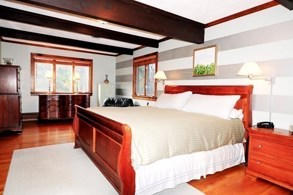 3 Bridge Street Dover, MA 02030 - Photo 12 of 15 a bedroom with a bed and a large window