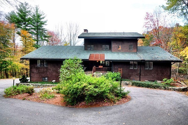 3 Bridge Street Dover, MA 02030 - Photo 15 of 15 a front view of a house with a garden