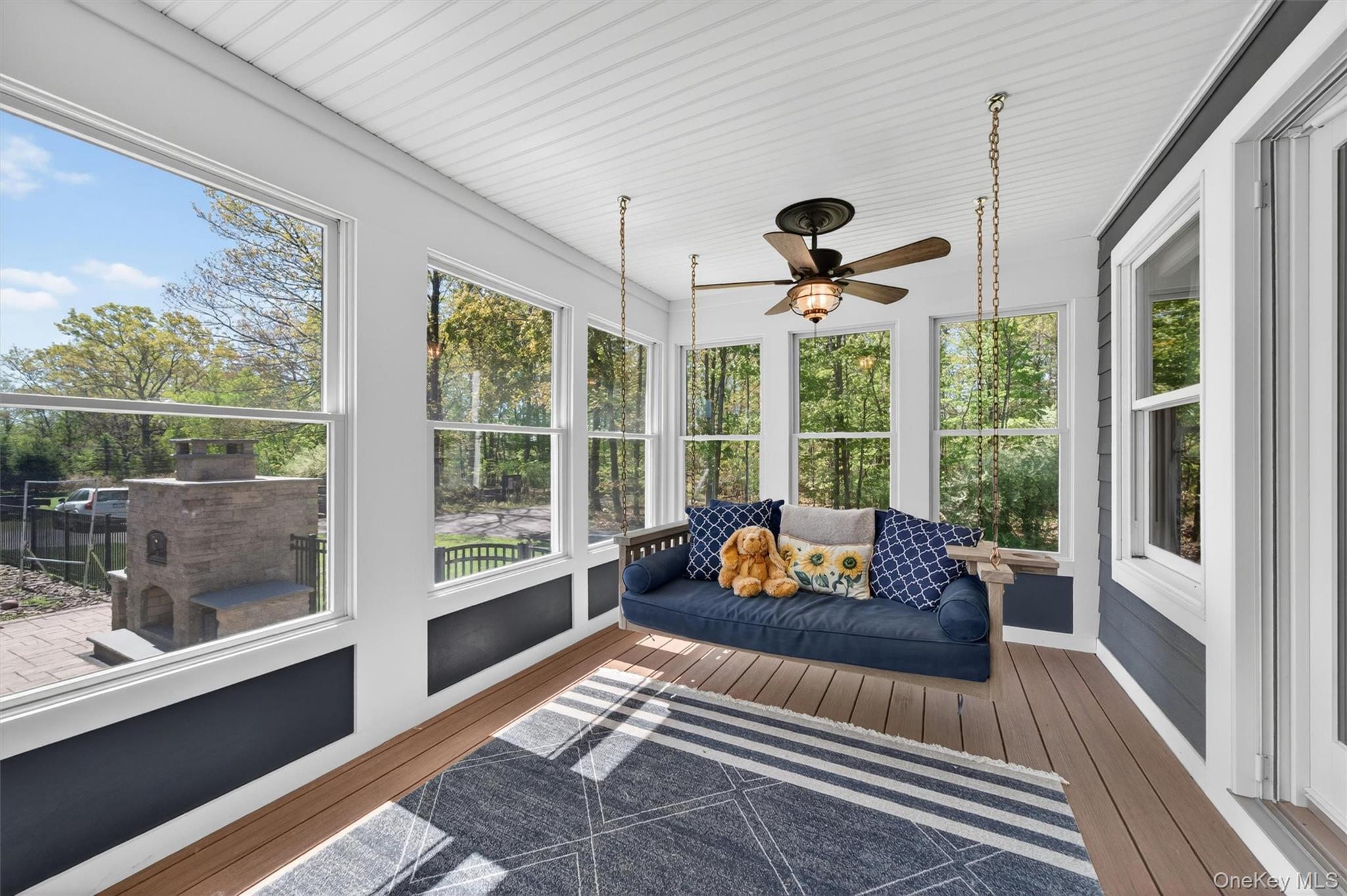 2 White Horse Road Middletown, NY 10940 - Photo 10 of 47 The covered porch extends the season of outdoor fun and is the perfect perch from which to observe all the activity on the pool deck!