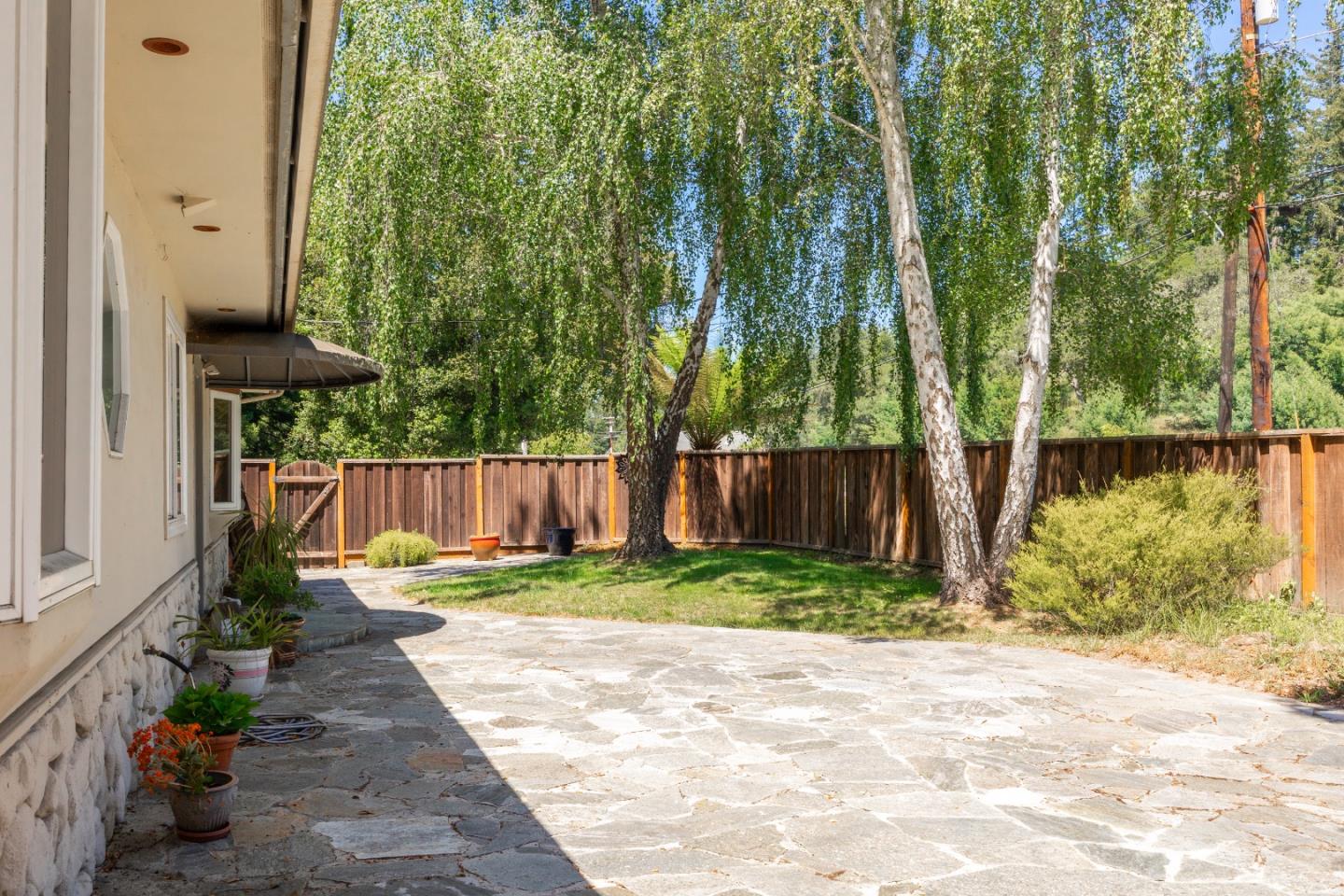 2000 Glen Canyon Road Santa Cruz, CA 95060 - Photo 3 of 41 a garden view with a seating space
