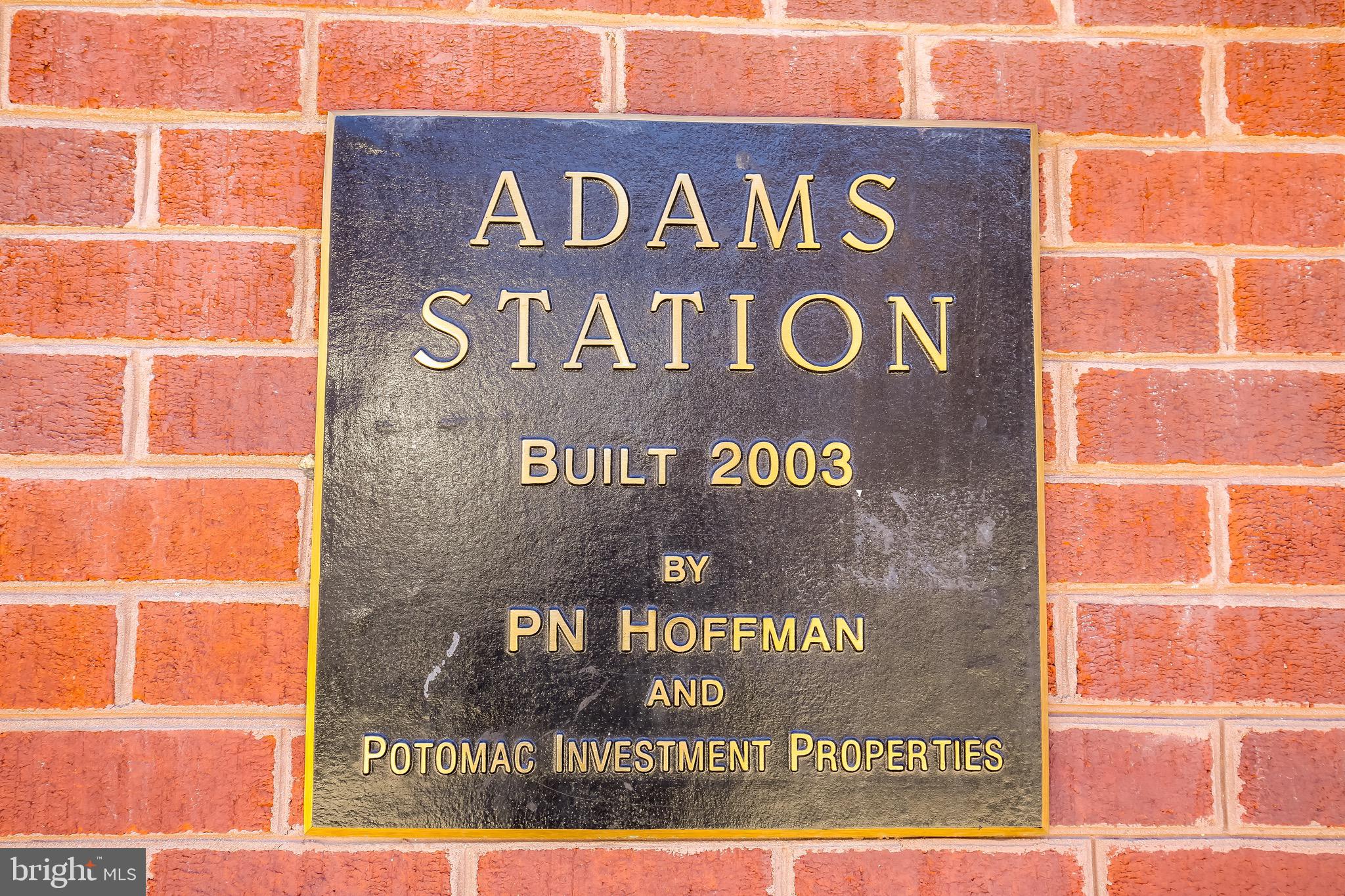 2421 18th Street Northwest, Unit 302 Washington, DC 20009 - Photo 2 of 30 a sign broad on front of a building
