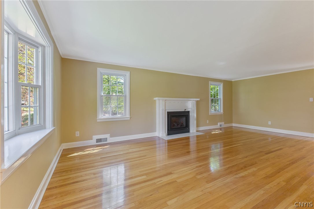 31 Lyndon Road Fayetteville, NY 13066 - Photo 6 of 47 Living room with a gas fireplace/remote.
Newer windows throughout.
