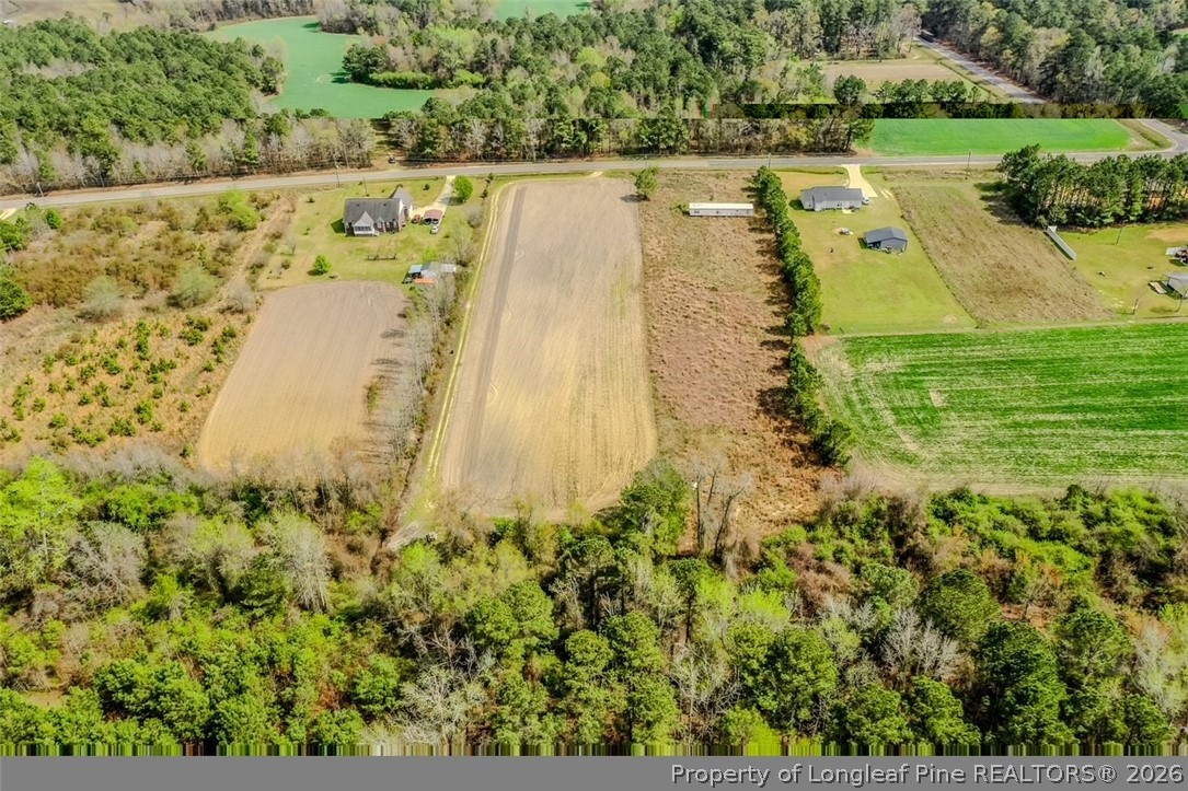 Rozier Siding Rd Street St. Pauls, NC 28384 - Photo 6 of 13 a view of a yard with a swimming pool