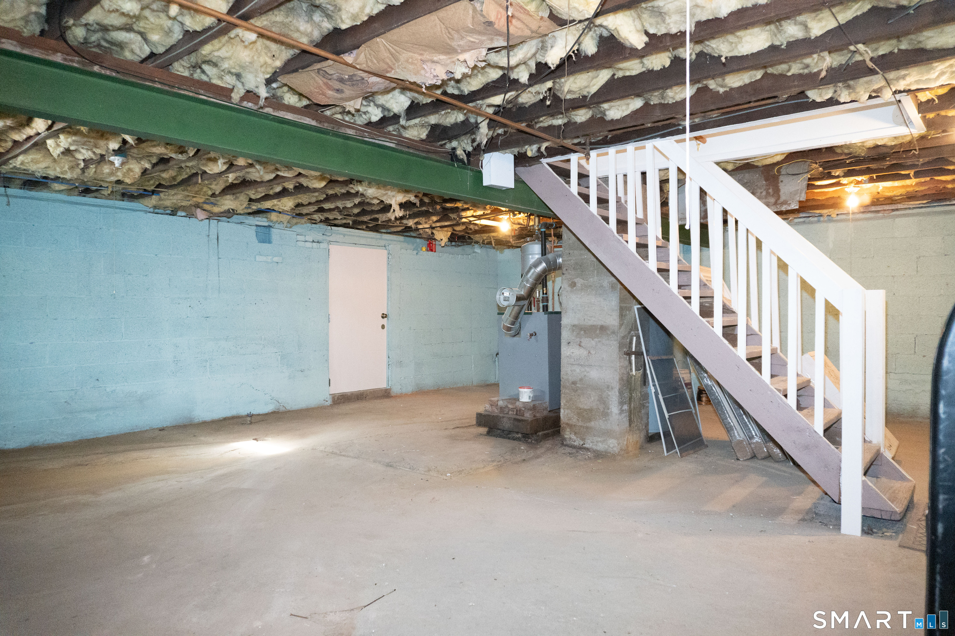 106 Augusta Street Watertown, CT 06779 - Photo 21 of 28 a view of an empty room with stairs
