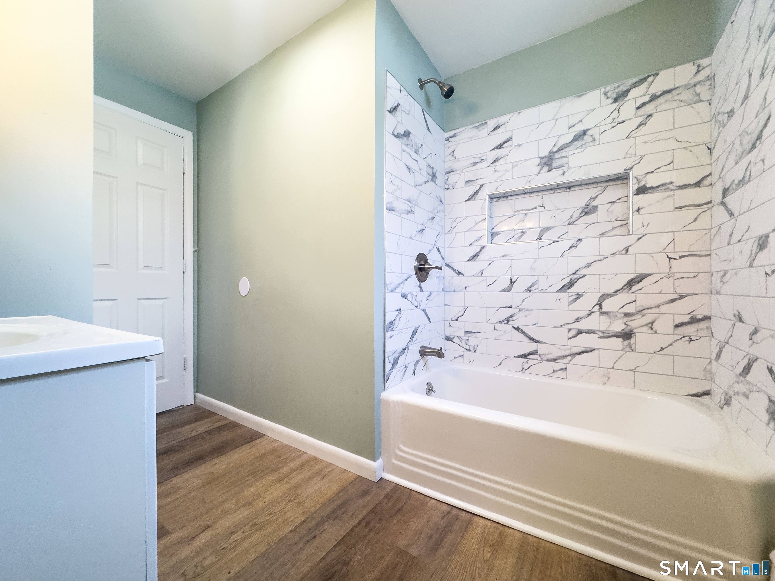 106 Augusta Street Watertown, CT 06779 - Photo 10 of 28 a bathroom with a bathtub and shower