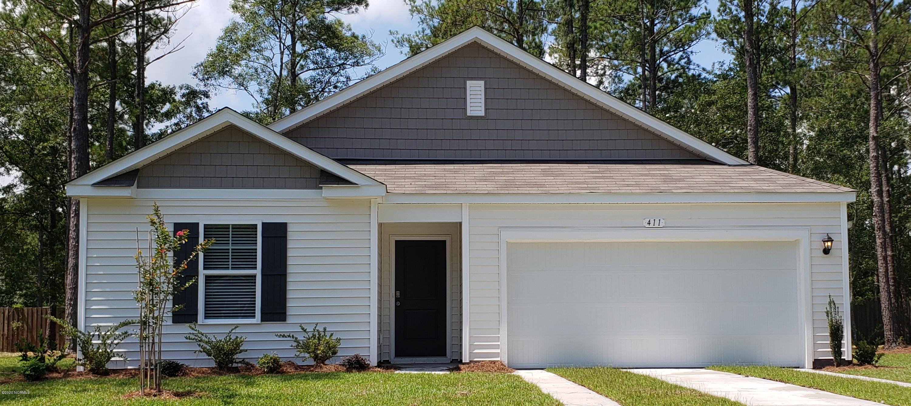 411 Ellis Road Southeast, Unit LOT #34 Bolivia, NC 28422 - Photo 1 of 46 Actual Home Photo Kerry plan with 3 bedrooms 2 baths and covered porch