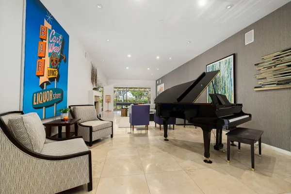 a living room with furniture and a rug