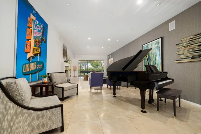 a living room with furniture and a rug