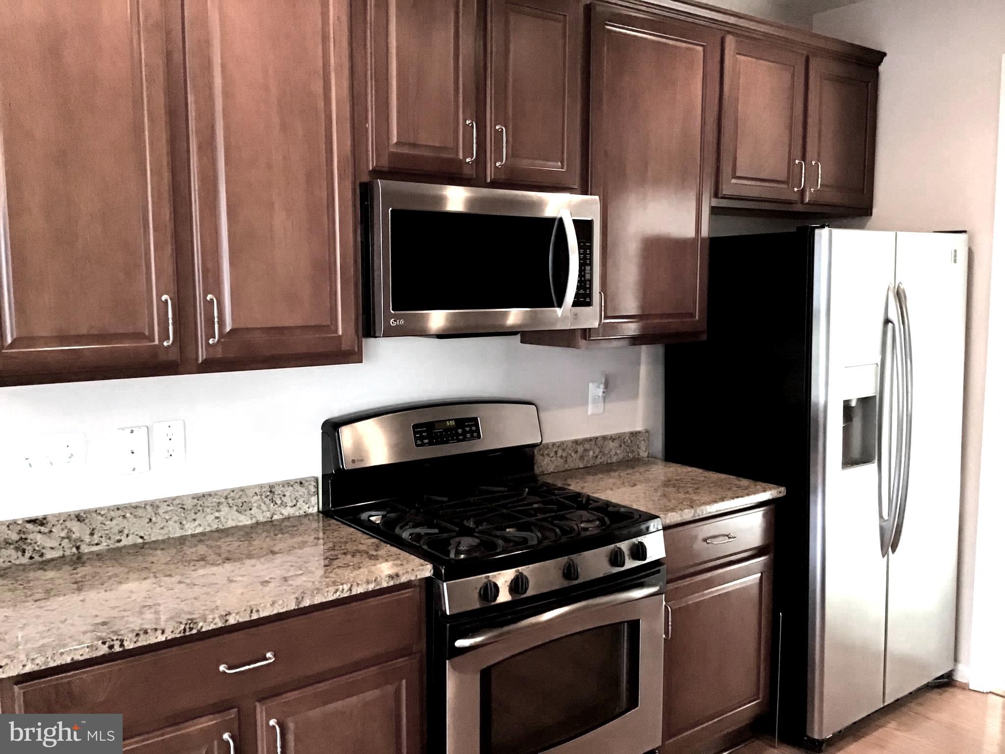 1402 P Joppa Forest Drive, Unit 14 Joppa, MD 21085 - Photo 8 of 28 NATURAL GAS STOVE