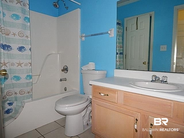 114 Pennbrooke Loop Foley, AL 36535 - Photo 5 of 23 Full bathroom featuring vanity, shower / bath combination, toilet, and tile patterned flooring
