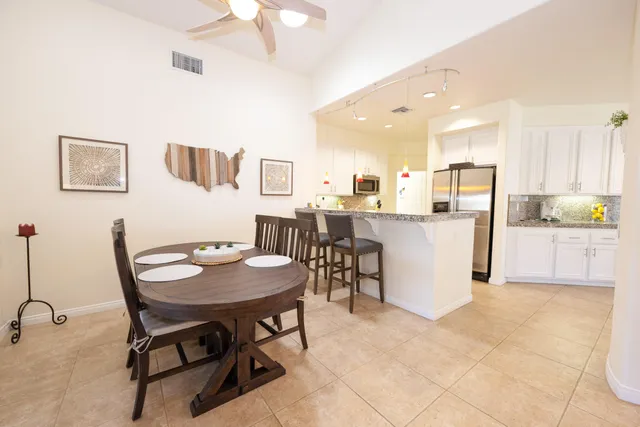 a view of a dining room with furniture