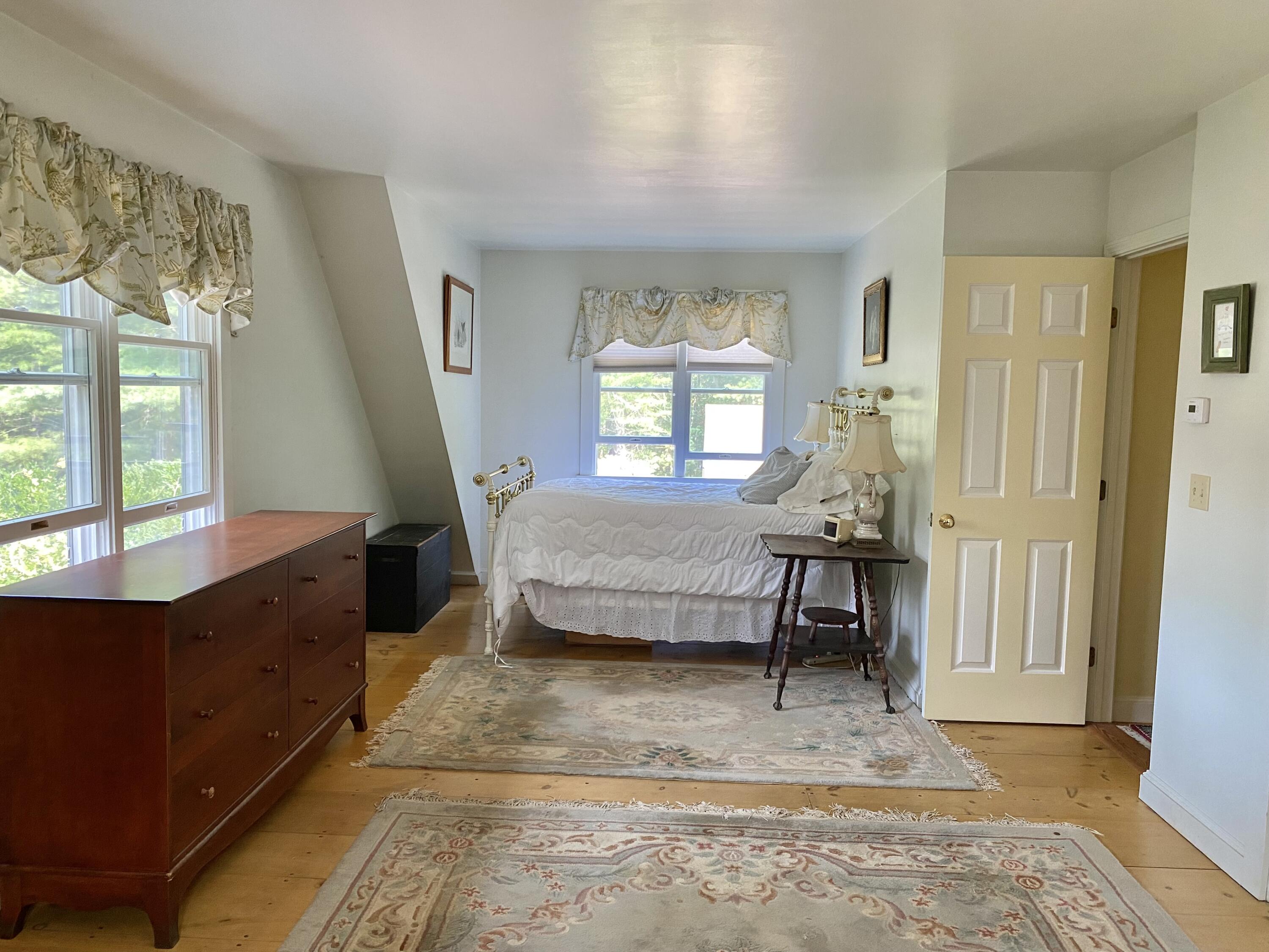 190 Little River Road Cotuit, MA 02635 - Photo 14 of 23 a living room with furniture and a window