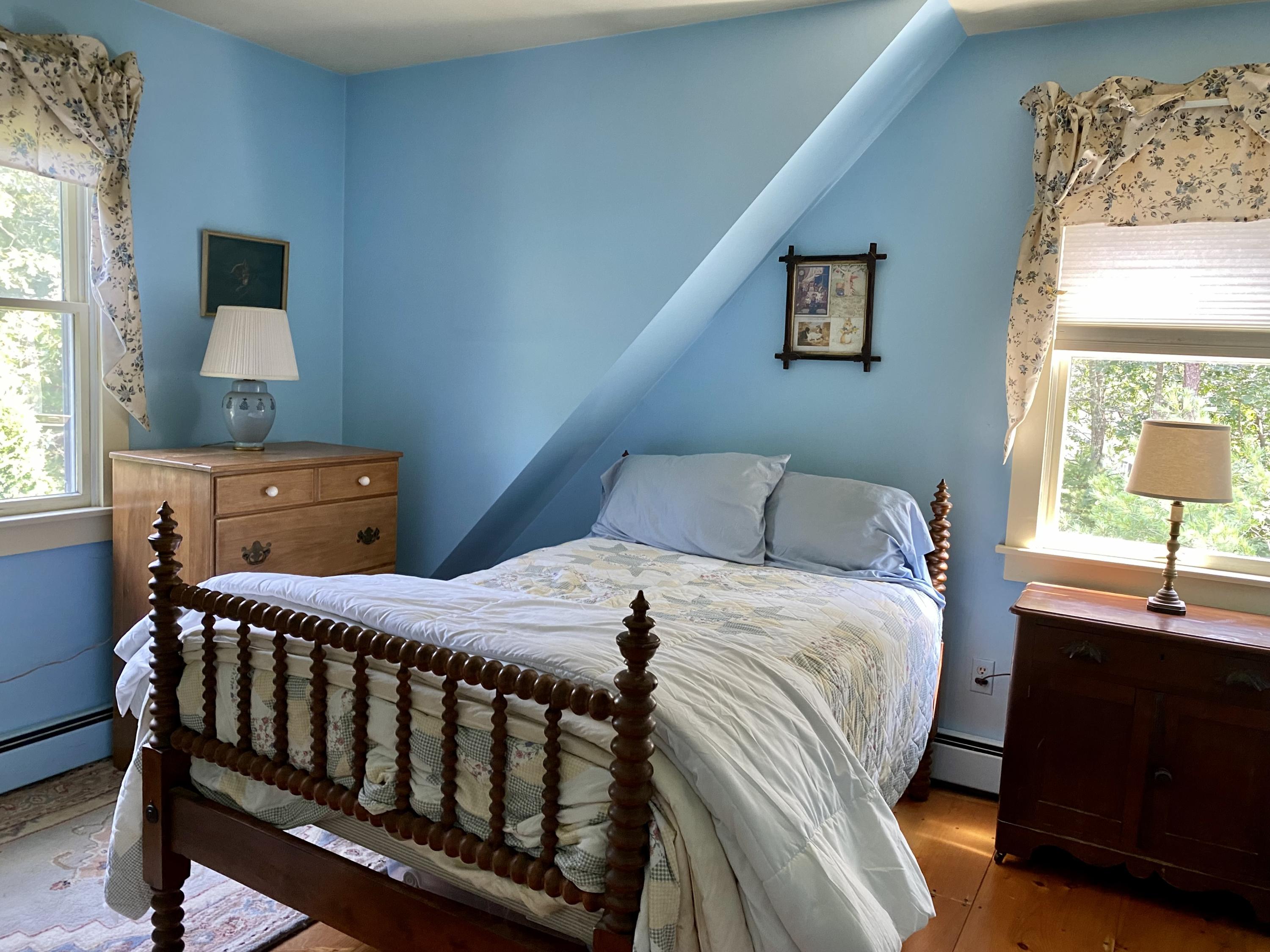 190 Little River Road Cotuit, MA 02635 - Photo 17 of 23 a bedroom with a bed and a window