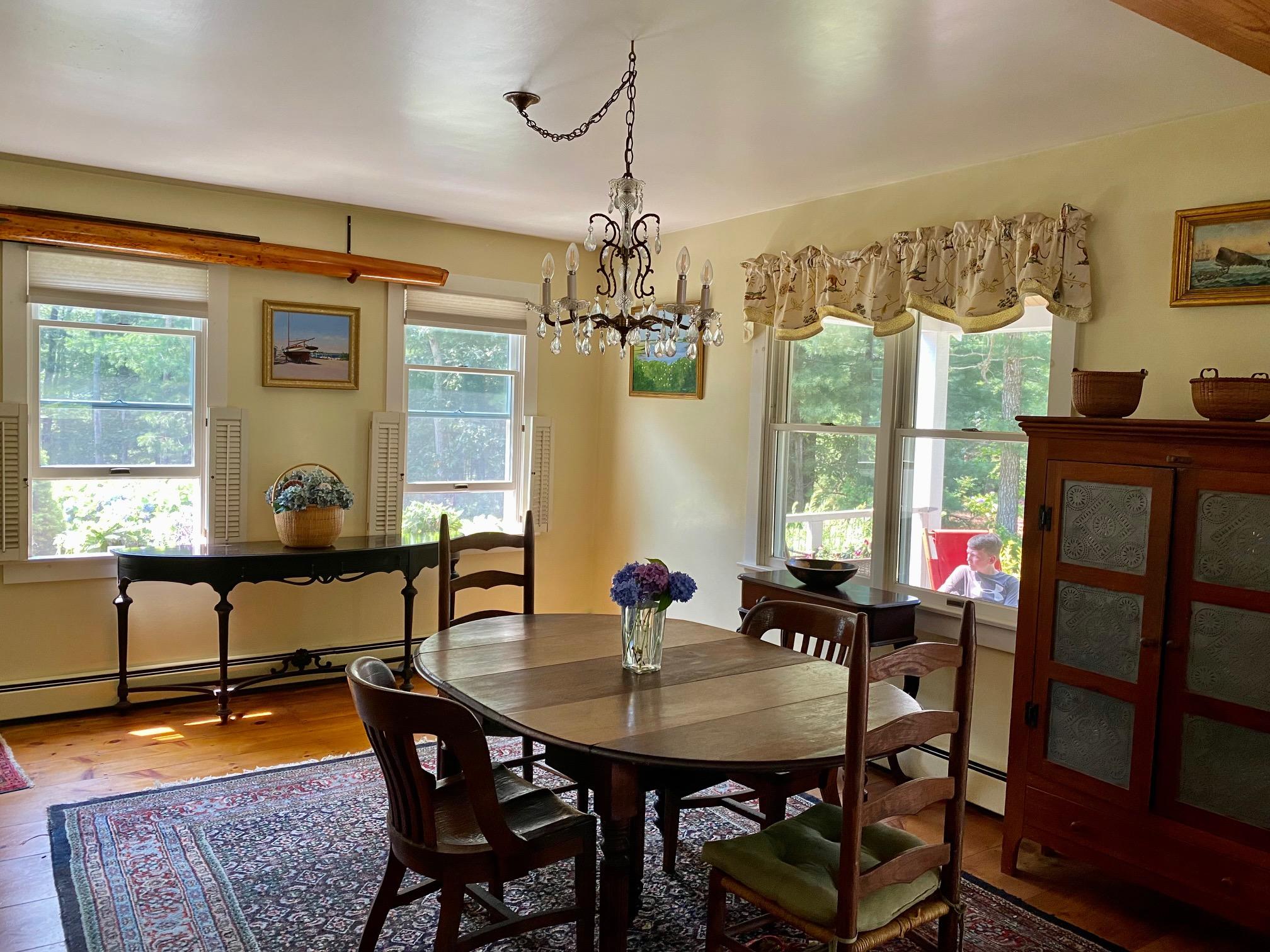 190 Little River Road Cotuit, MA 02635 - Photo 6 of 23 a view of a dining room with furniture window and wooden floor