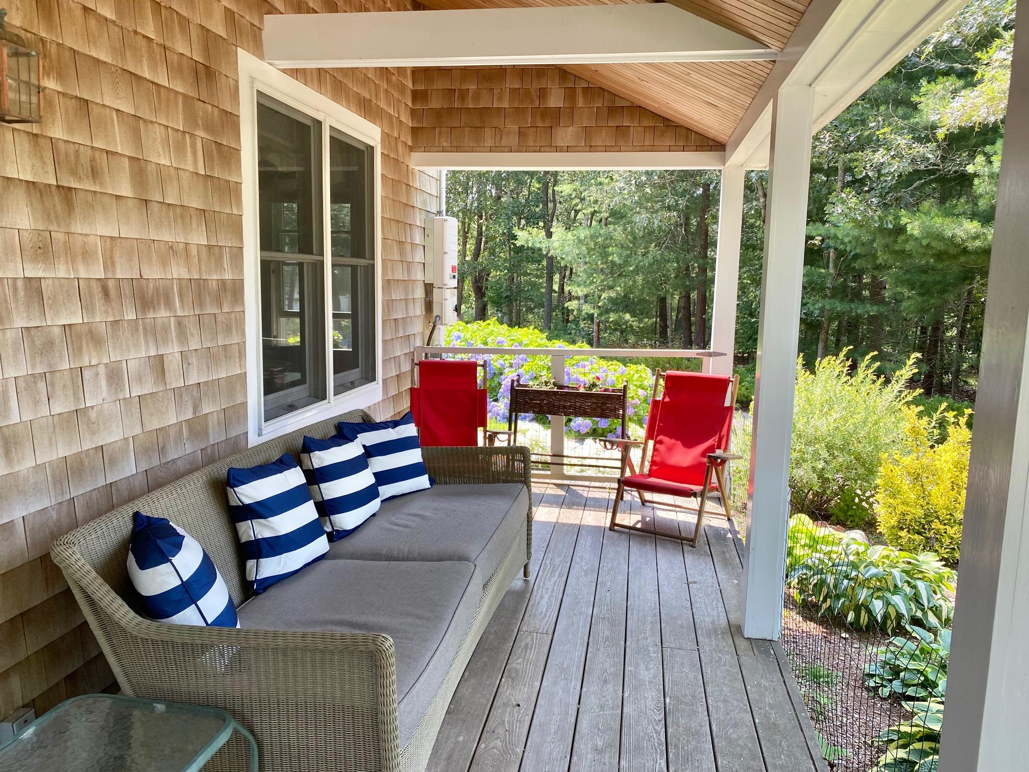 190 Little River Road Cotuit, MA 02635 - Photo 9 of 23 a outdoor living space with furniture and garden view