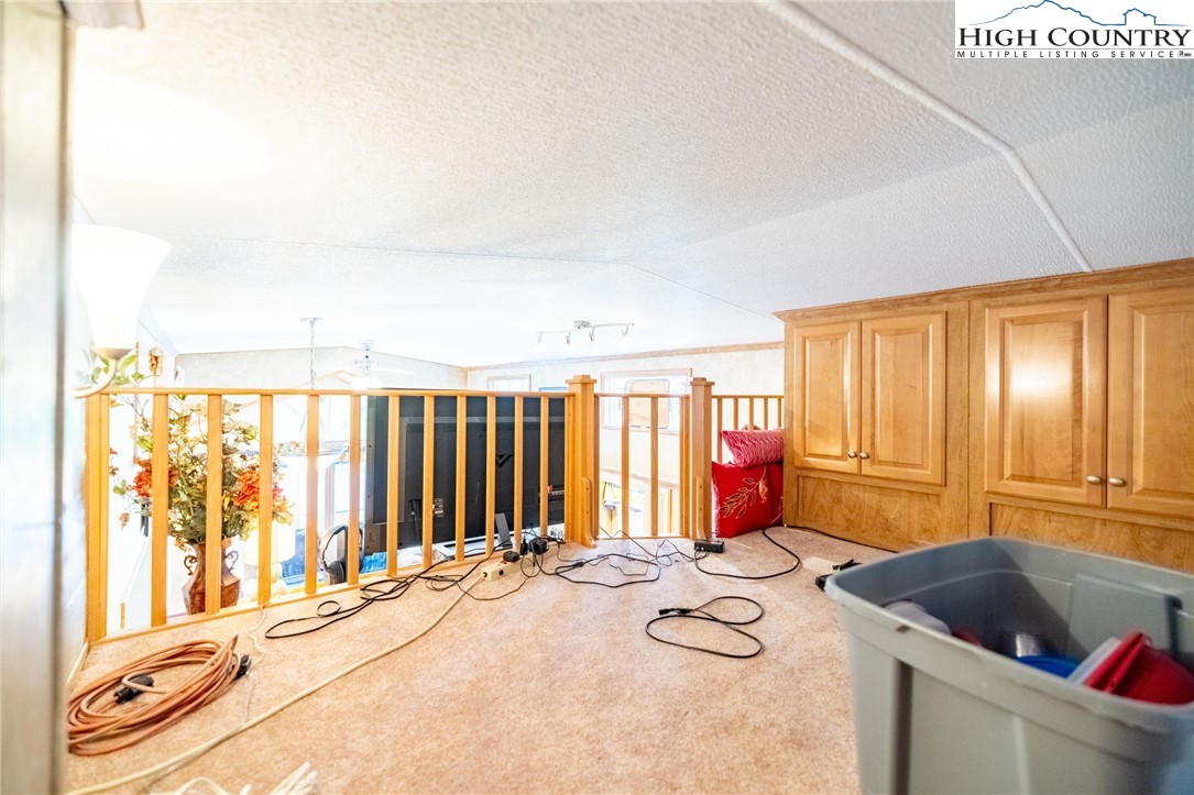 2330 Edmonds Road Galax, VA 24333 - Photo 15 of 42 a spacious bedroom with a bed and a large window