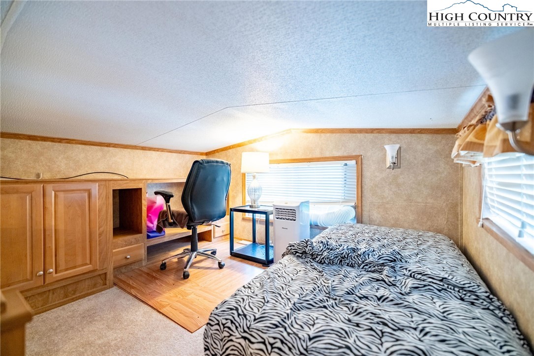 2330 Edmonds Road Galax, VA 24333 - Photo 16 of 42 a bedroom with a bed and a window