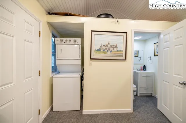 a hallway with a white wooden door