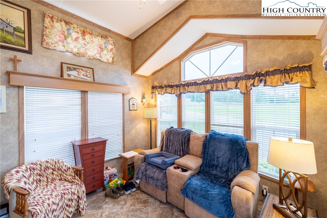 2330 Edmonds Road Galax, VA 24333 - Photo 5 of 42 a living room with furniture a floor to ceiling window