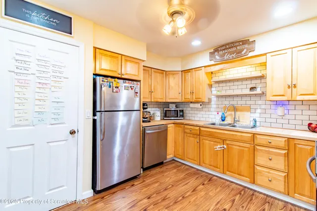 a bedroom with a bed and a table in it