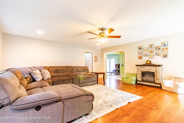 a living room with furniture and a gate