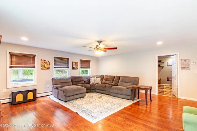 a room with window and chairs