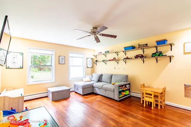 a bathroom with a sink mirror toilet and shower