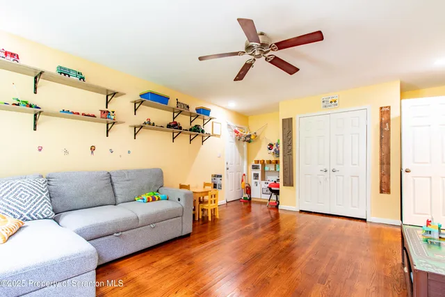 a view of a park with swings and slides